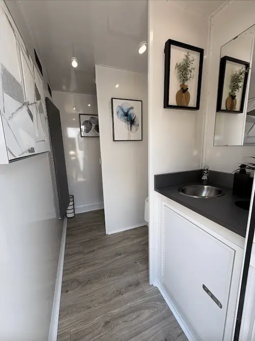 portable restroom trailer male interior sink photo