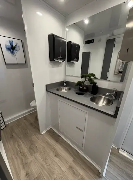 portable toilet rental interior female dual sink photo